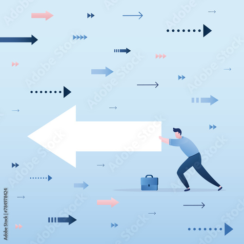 Businessman pushing arrow in opposite direction. New ideas change way and direction of thinking, smart man moves in other way, overcoming obstacles. New opportunities.