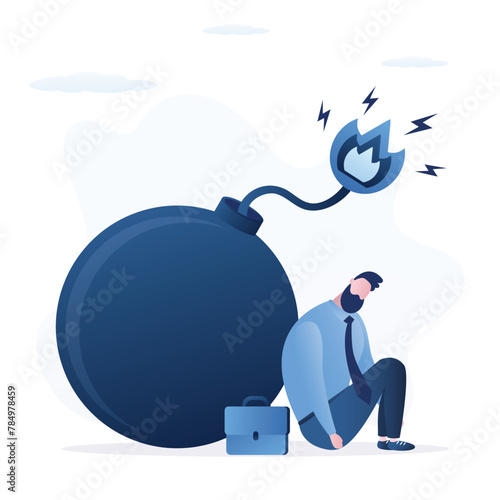 Frustrated unhappy businessman sitting near bomb and feeling unsafe, burnout. Risk management, fear of mistake and problems. Business stress, difficulties at work