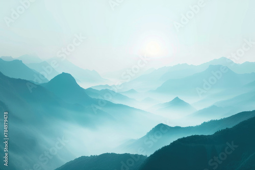 Ethereal Landscape of Blue Misty Mountains During a Tranquil Sunrise