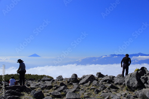 Mt.Fuji floating in the sea of clouds seen from the top of Mt.Amigasa photo