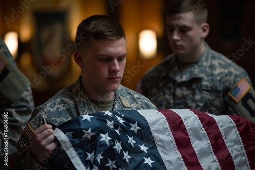 A focused soldier in uniform is meticulously folding the American flag at a military ceremony