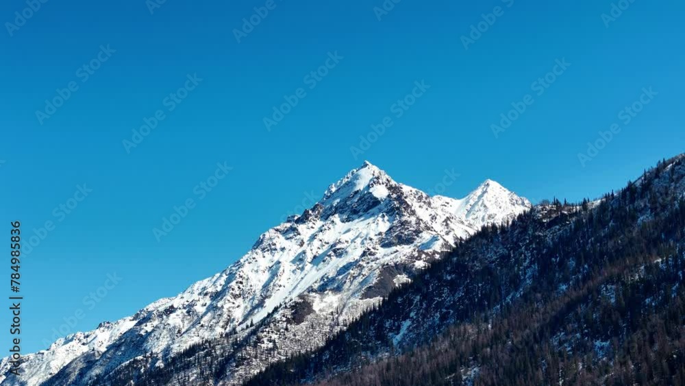 Snowy Alaskan Peak with the moon Snowy Alaskan Peak with the moon