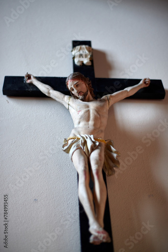 Small wooden crucifix of Jesus Christ photo