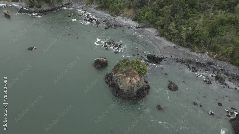 Rocky Beach With Offshore Rocks In The Coast Of Trinidad In California, USA. - aerial shot Rocky Beach With Offshore Rocks In The Coast Of Trinidad In California, USA. - aerial shot