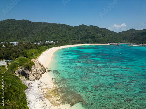 Okinawa, Japan: Aerial view of the Aharen beach in the tropical Tokashiki island in Okinawa in the Pacific Ocean. photo