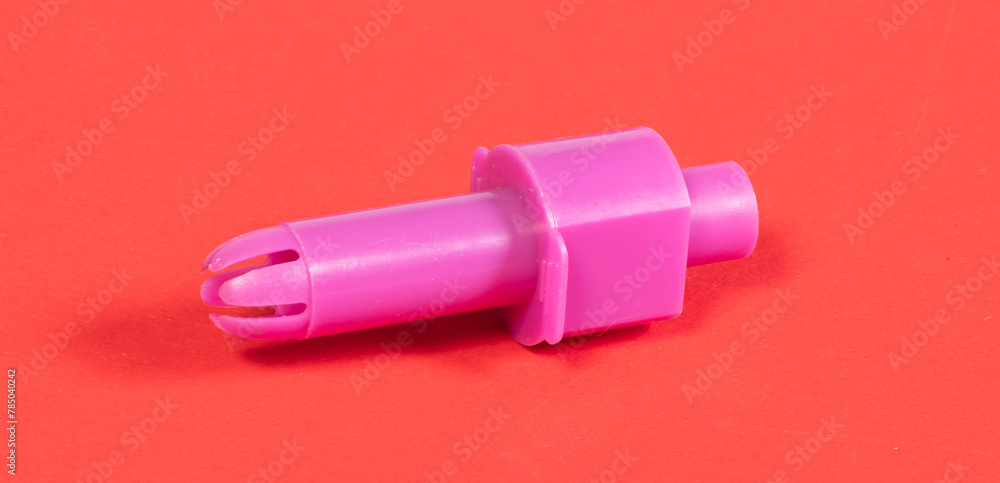 Old confectionery syringe isolated on solid background Old confectionery syringe isolated on solid background