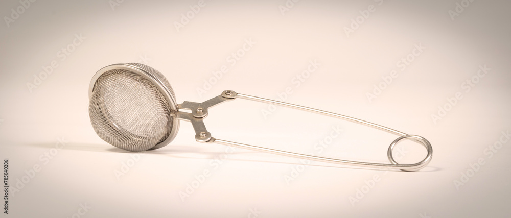 Used tea strainer isolated on white Used tea strainer isolated on white