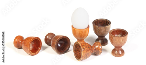 Wooden eggcups isolated on white background