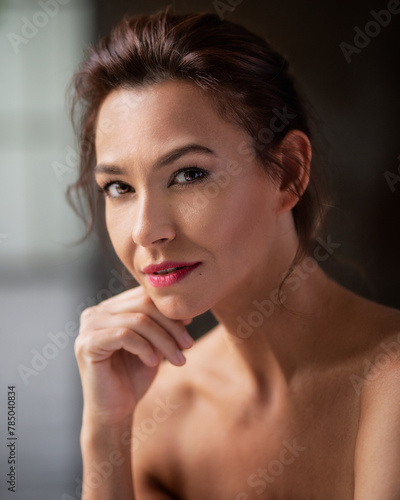 Portrait of a beautiful brown hair mid adult woman