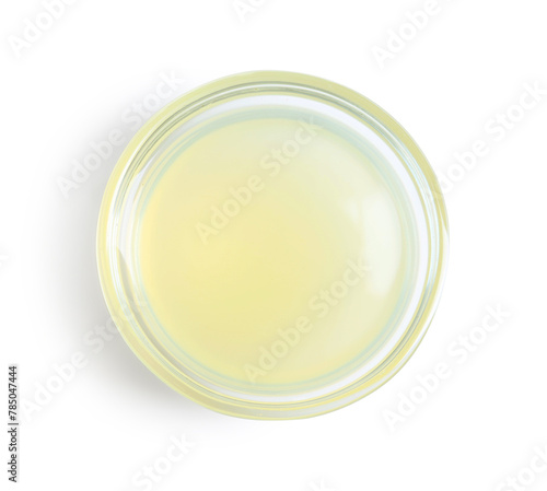 Refreshing lemon juice in glass isolated on white, top view