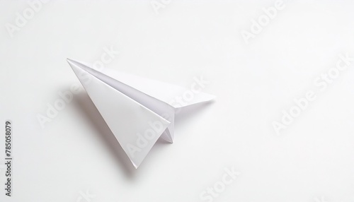 white paper airplane concept origami isolated on white background with copy space, simple starter craft for kids for weekend arts and craft entertainment