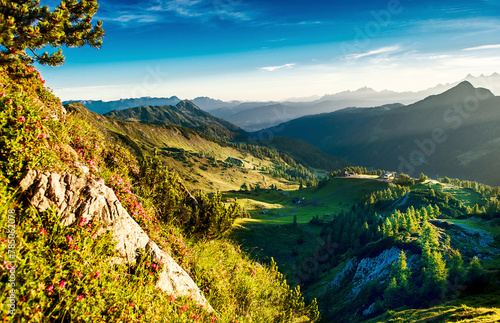 Austria, Salzburger Land, Green mountain valley at summer dawn photo