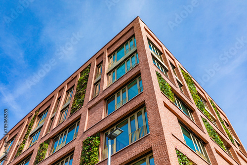 Germany, Baden-Wurttemberg, Stuttgart, Office building with facade greenery photo