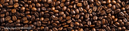 wallpaper of coffee beans  seamless pattern. Numerous brown  perfectly shaped and detailed coffee beans arranged in neat rows.