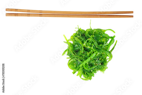 Wakame seaweed and chopsticks isolated on white background.Top view