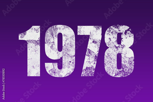 flat white grunge number of 1978 on purple background.