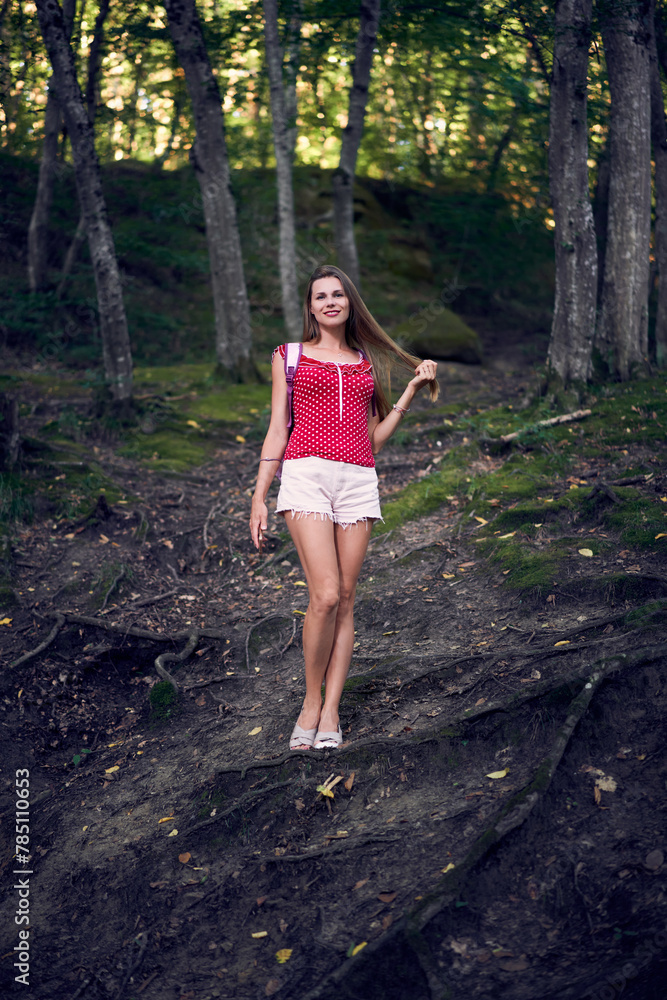 Portrait of a young woman in the park. Summer activity Portrait of a young woman in the park. Summer activity