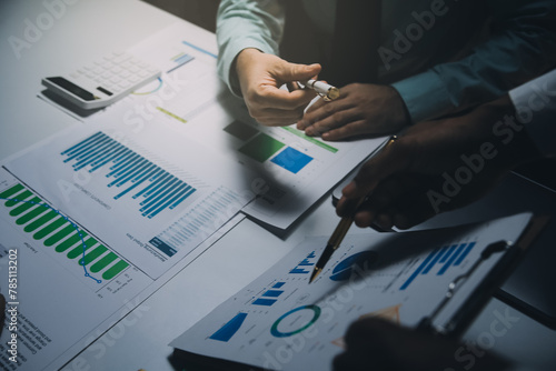 Business team meeting present, investor colleagues consultation and conference new strategy plan business and market growth on financial document graph report, Meeting and Talking.