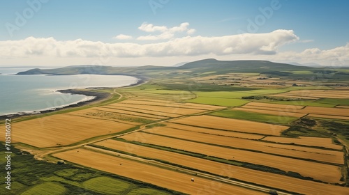 Coastal farming extends fields to meet sandy shores, blending agriculture with the coastal landscape, where land and sea converge in harmonious synergy. 