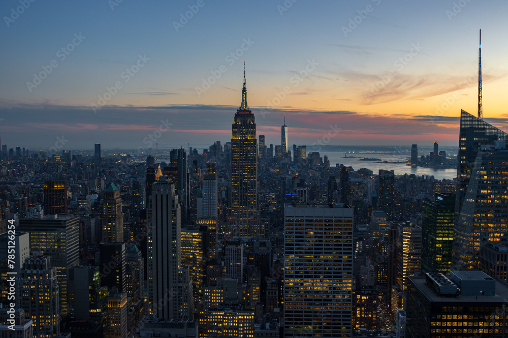 Sunset view of New York City skyline from a rooftop (Usa)