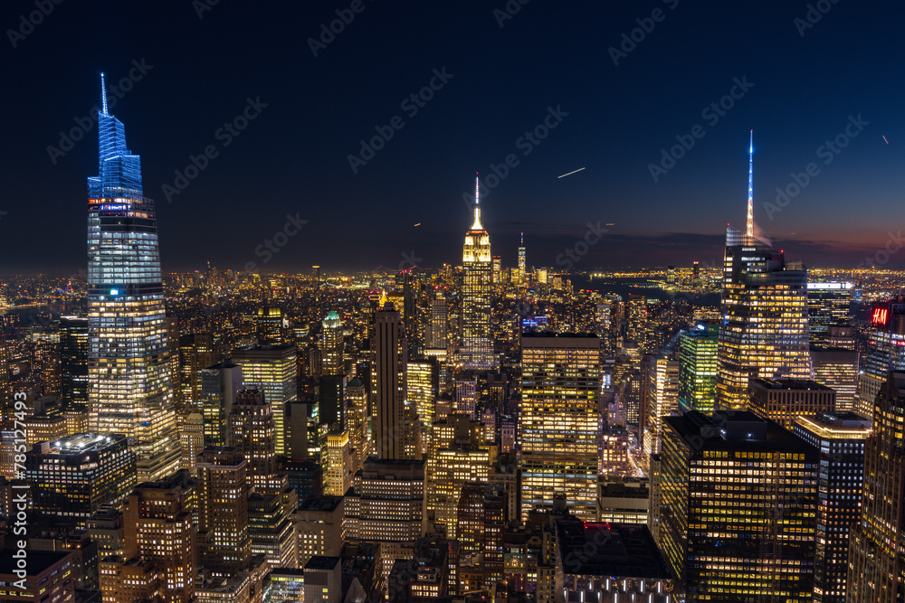 Sunset view of New York City skyline from a rooftop (Usa)
