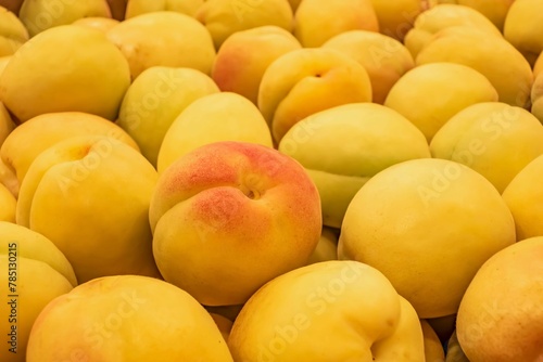 Pile of fresh ripe apricots in a market