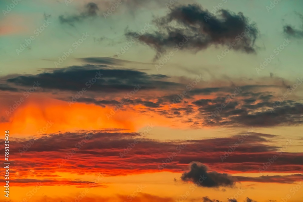 Fototapeta premium Big clouds in the sky at sunset