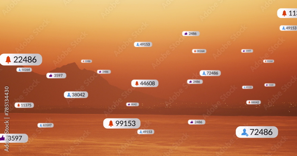 Obraz premium Image of social media icons over sunset and sea landscape