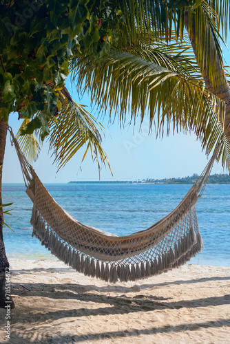 Fototapeta Naklejka Na Ścianę i Meble -  beach hammock in Maldives, empty hammock, beach holidays,  travel to Thulusdhoo island