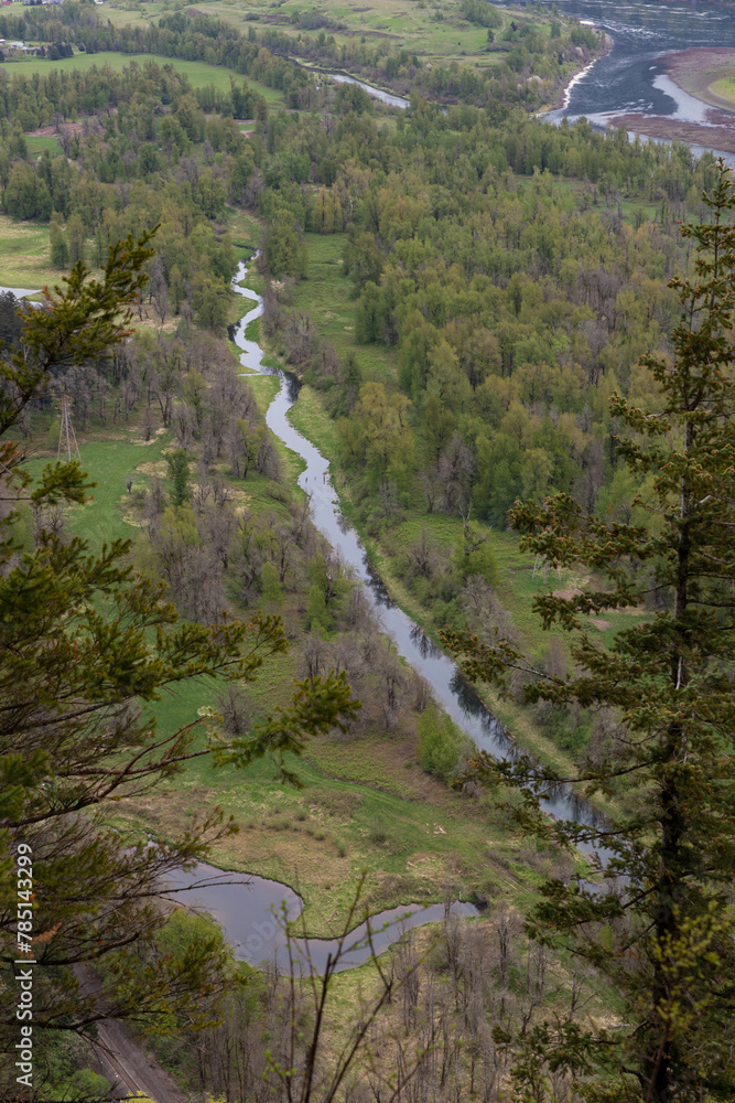 Columbia River Gorge and its surrounding beautiful green nature as seen from a hiking trail on Beacon Rock, Washington Columbia River Gorge and its surrounding beautiful green nature as seen from a hiking trail on Beacon Rock, Washington