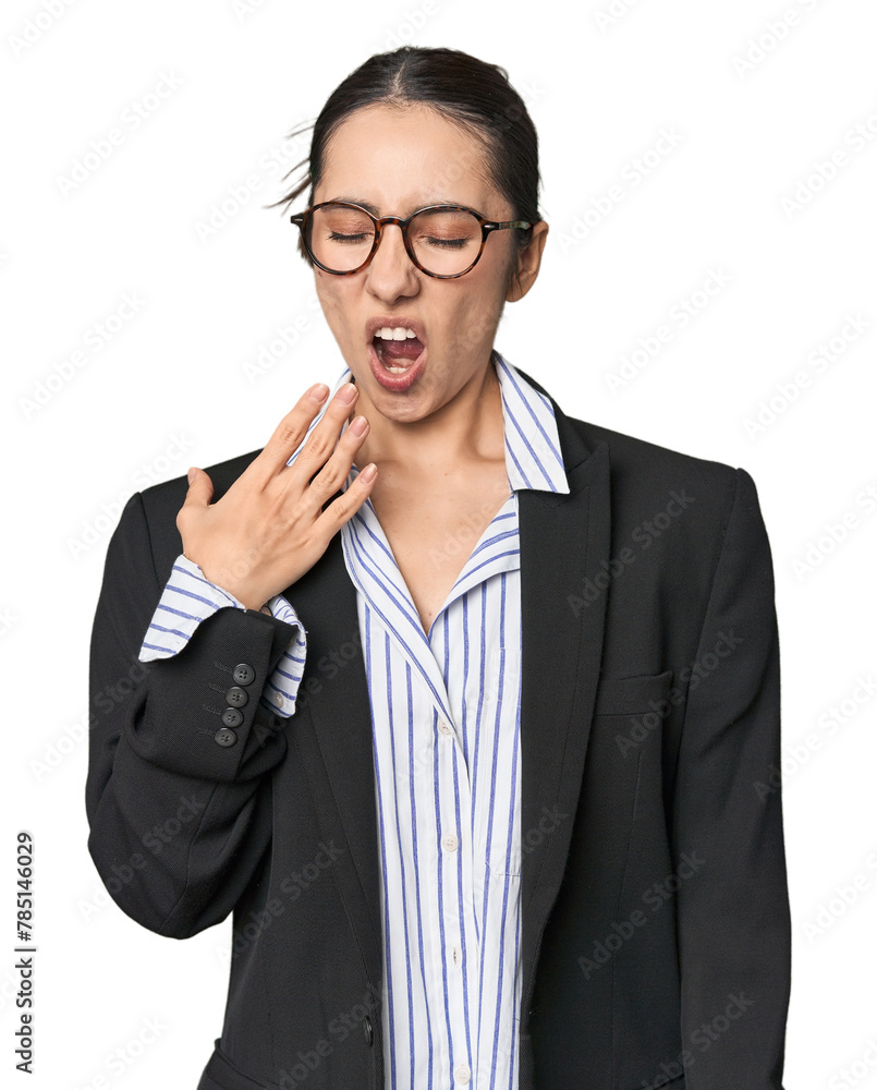 Confident young Caucasian businesswoman on studio background yawning showing a tired gesture covering mouth with hand. Confident young Caucasian businesswoman on studio background yawning showing a tired gesture covering mouth with hand.