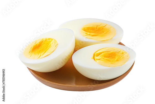 A Trio of Hard-Boiled Eggs Resting on a Rustic Wooden Plate. On White or PNG Transparent Background.