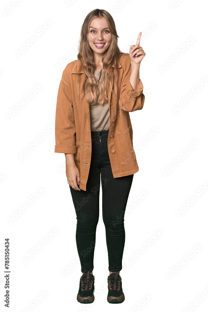 Studio portrait of a blonde Caucasian woman showing number one with finger. Studio portrait of a blonde Caucasian woman showing number one with finger.