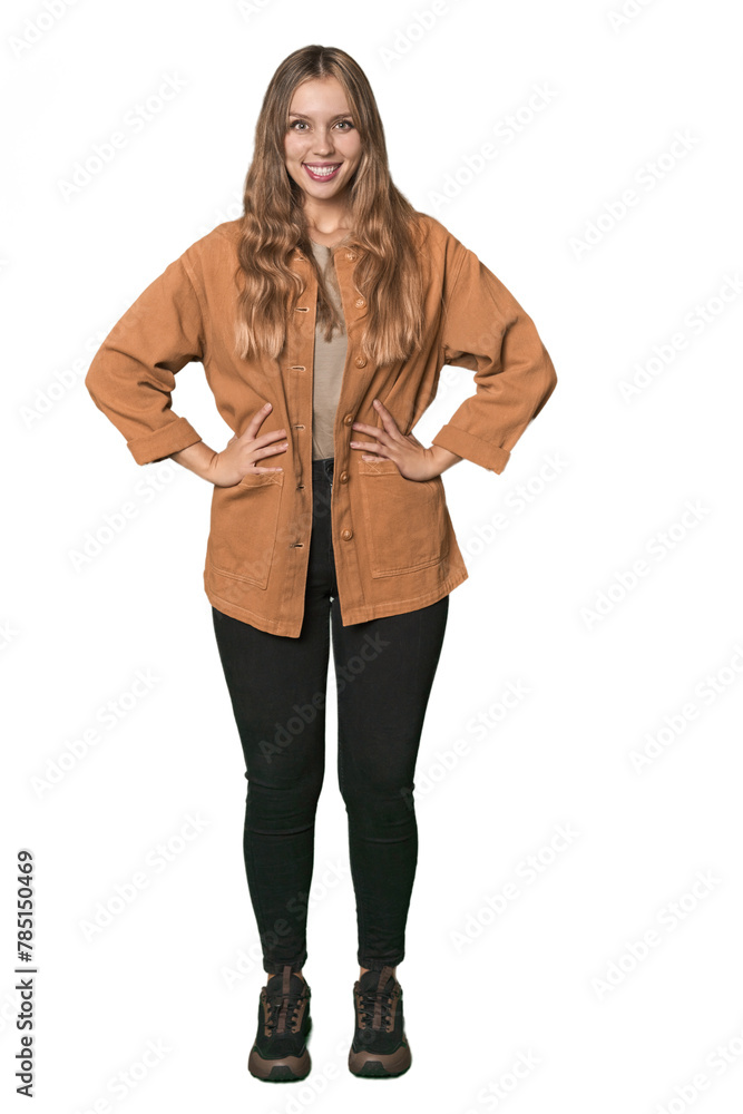 Studio portrait of a blonde Caucasian woman confident keeping hands on hips. Studio portrait of a blonde Caucasian woman confident keeping hands on hips.