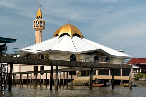 A view of Bandar Seri Begawan, the capital of Brunei Darussalam, while sailing on the Sungai Brunei river. Borneo island. Asia. photo