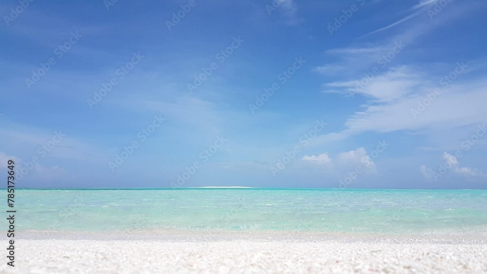Fototapeta premium Beautiful view of a calm blue sea on sunny day in Asia