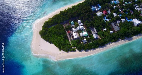 Top view of Ukulhas island in Maldives with white sandy beach photo