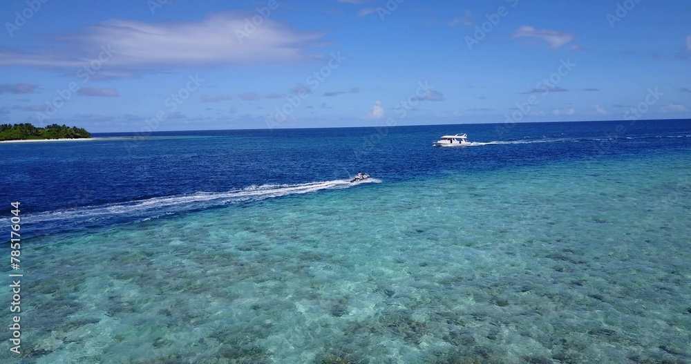 Aerial view of motorboats moving in the sea Aerial view of motorboats moving in the sea
