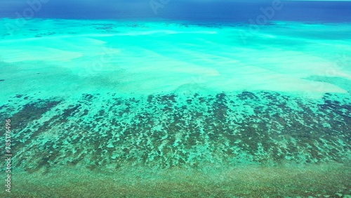 Bird's eye view of the azure water of the ocean in Asia