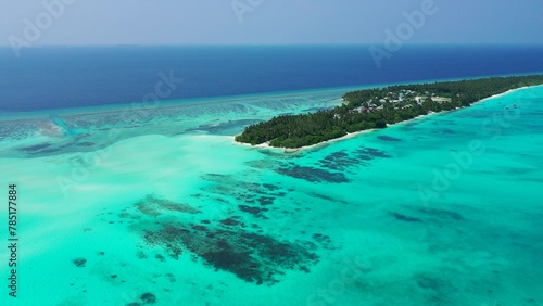 Beautiful view of an island with a sea on a sunny day © Wirestock