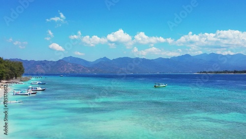 Beautiful view of a seascape with boats under a blue sky in Asia