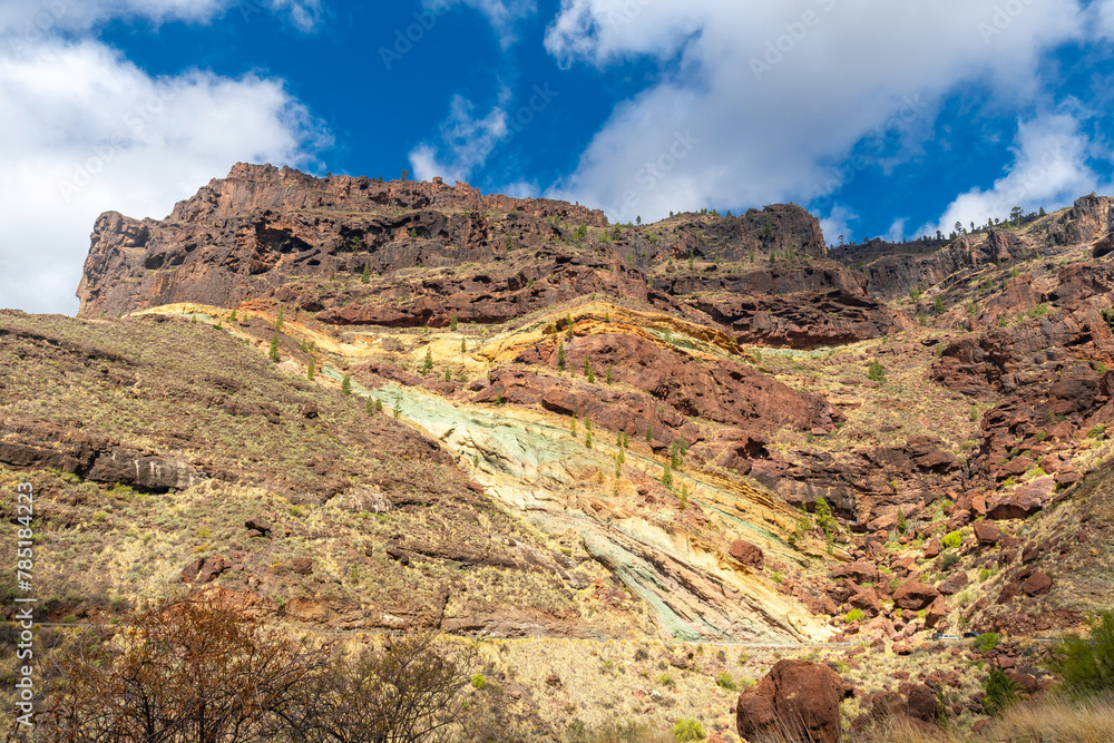 Azulejos de Veneguera or Rainbow Rocks Natural Monument in Mogan, Gran Canaria Azulejos de Veneguera or Rainbow Rocks Natural Monument in Mogan, Gran Canaria