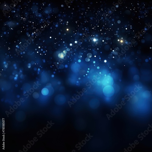 Indigo abstract glowing bokeh lights on a black background with space for text or product display. 