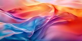 A colorful, flowing piece of fabric with a blue, red, and yellow gradient