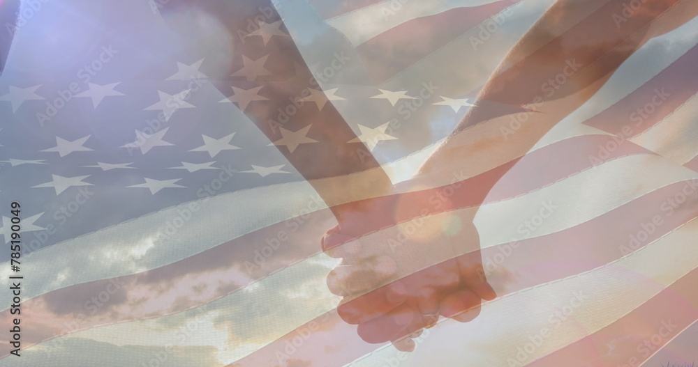 Fototapeta premium Image of flag of united states of america over couple holding hands