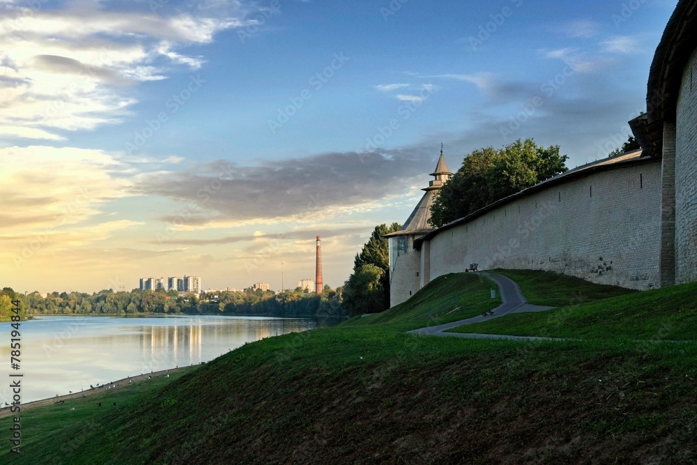 Pskov, Russia, September 11, 2023. Dawn over the walls of the ancient Kremlin. - obrazy, fototapety, plakaty 