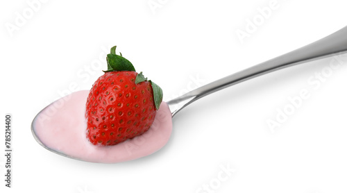 Spoon with yogurt and strawberry isolated on white