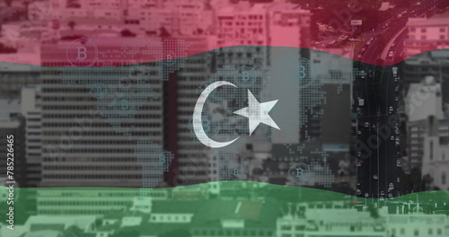 Image of map and bitcoin icons over flag of libya against time-lapse of vehicles on street