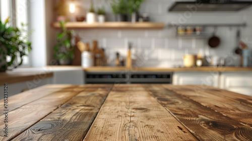 A wooden table placed in a kitchen with a blurred background, creating a visually appealing and cozy home decor setting. © ChubbyCat
