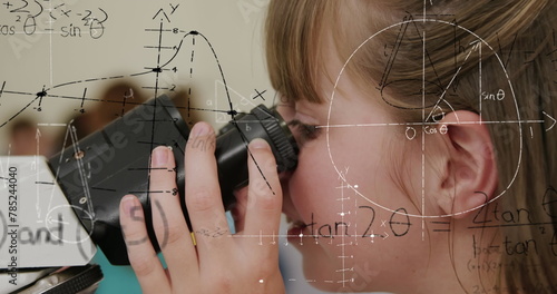 Image of mathematical formulae over smiling schoolgirl using microscope